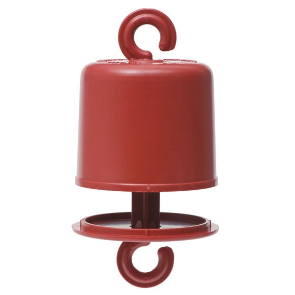 An Ant Guard® from Perky-Pet® will repel ants from a hummingbird feeder.