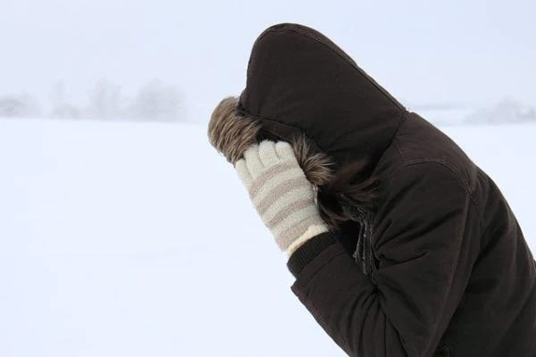 A person bundled up against the winter cold