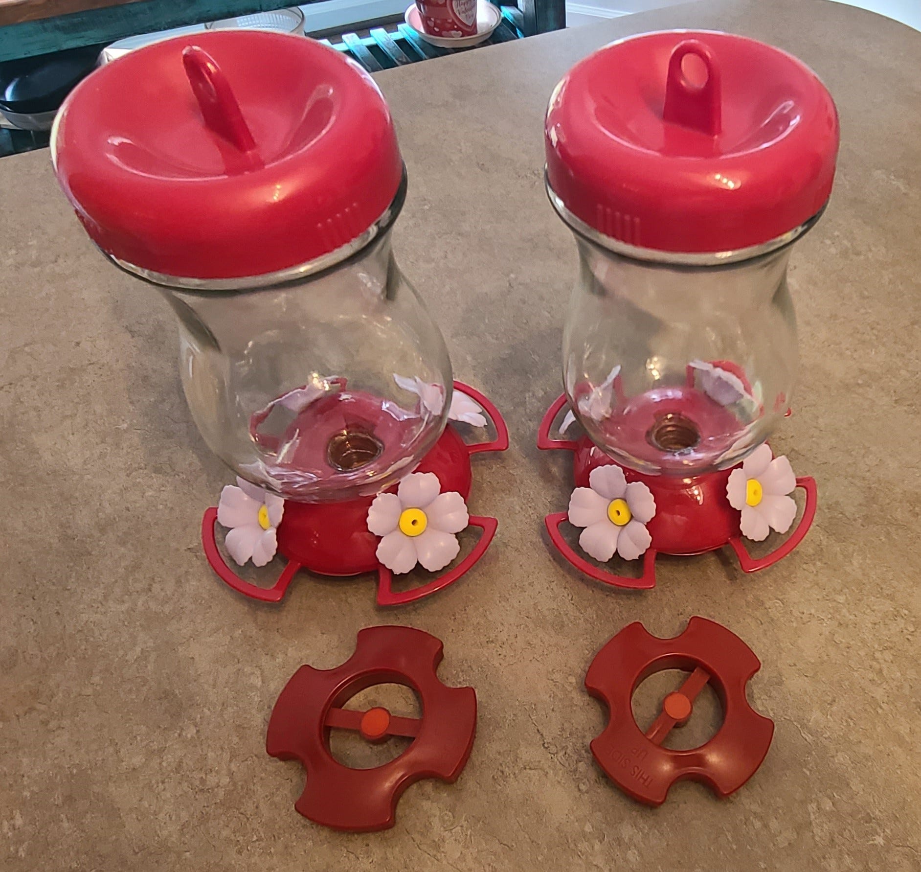 A real photo of Perky-Pet® Pink Top-Fill Glass Hummingbird Feeder by spud (1)